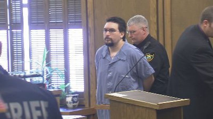 Uriah Brosnan is led from the courtroom following his sentence on Jan. 21, 2010. Brosnan will serve 18 years in prison for the murder of his estranged wife, Becky. (KHQ)