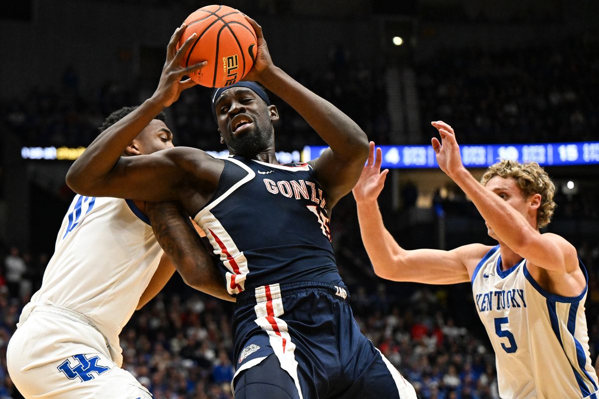 Gonzaga Bulldogs forward Graham Ike (15) crashes through the Kentucky Wildcats and scores during the first half of a college basketball game on Friday, Dec 5, 2025, at Bridgestone Area in Nashville, Tenn. (Tyler Tjomsland/The Spokesman-Review)