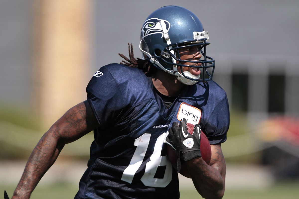 New Seahawks receiver Sidney Rice runs following a reception. (Associated Press)