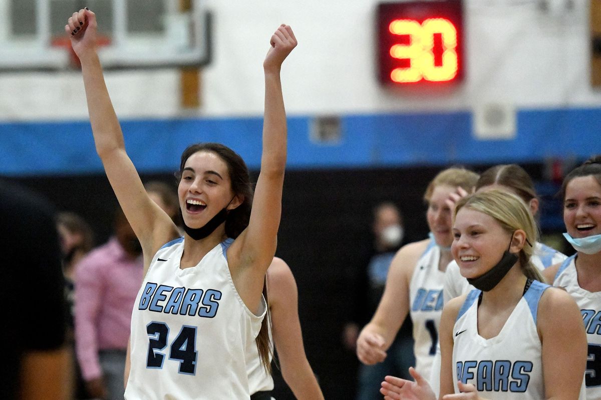 Central Valley’s Chloe Williams (24) celebrates after her Bears defeated Mead 63-60 during the East Region championship game at Central Valley on Wednesday.  (Kathy Plonka/The Spokesman-Review)