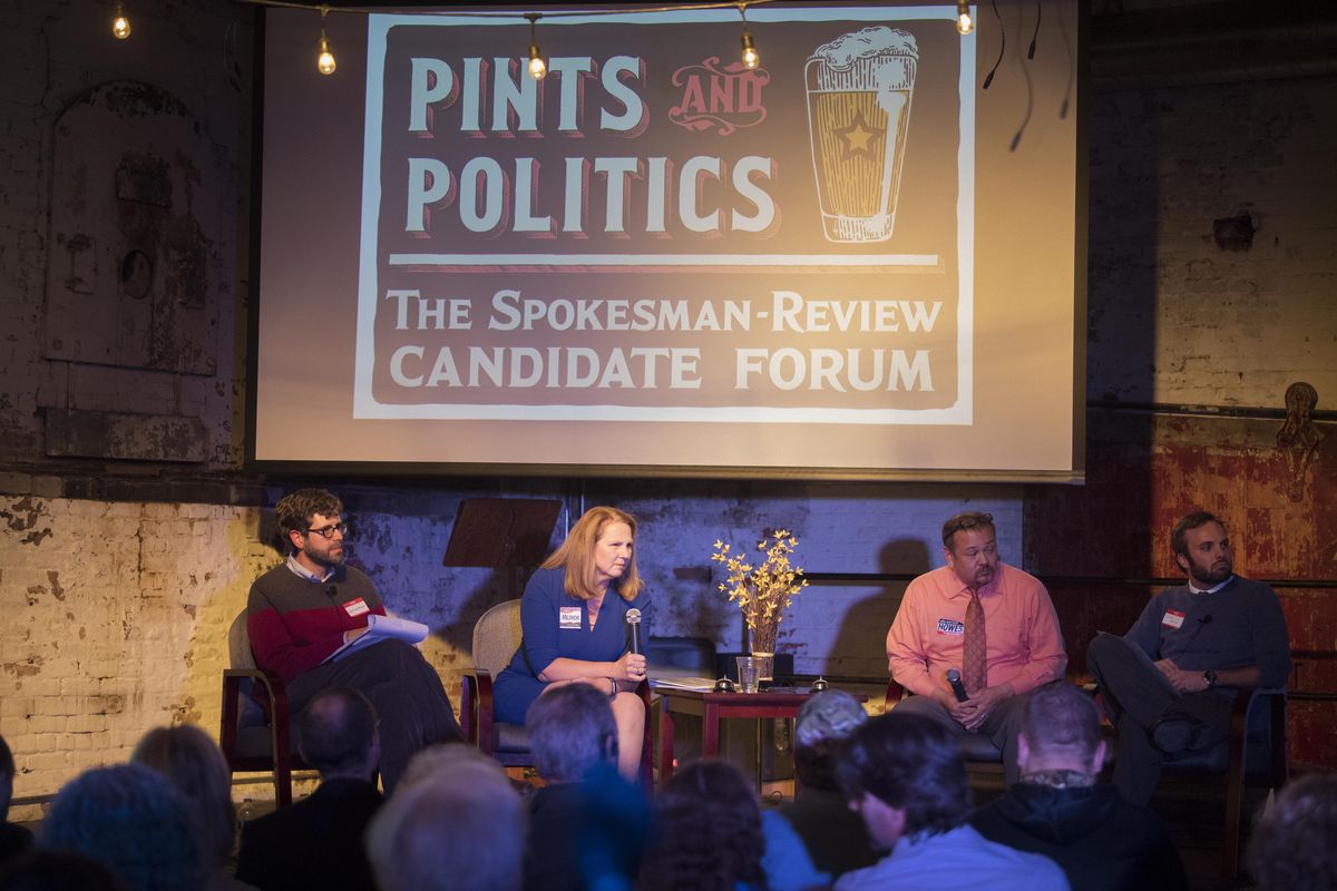 At the first Pints and Politics, from left, S-R government editor Jonathan Brunt, candidate Candace Mumm, candidate Matthew Howes and S-R reporter Kip Hill participate in a candidate debate Tuesday, Oct. 17, 2017 at the Washington Cracker building. (Jesse Tinsley / The Spokesman-Review)