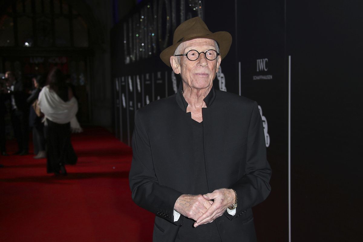 Oct. 6, 2015,  photo shows John Hurt posing for photographers upon arrival at the BFI Luminous Gala Dinner in London. The great and versatile actor Sir John Hurt, who could move audiences to tears in “The Elephant Man,” terrify them in “Alien,” and spoof that very same scene in “Spaceballs,” has died at age 77. Hurt, who battled pancreatic cancer, died Friday, Jan. 27, 2017, in London according to his agent Charles McDonald. (Joel Ryan / Joel Ryan/Invision/AP)