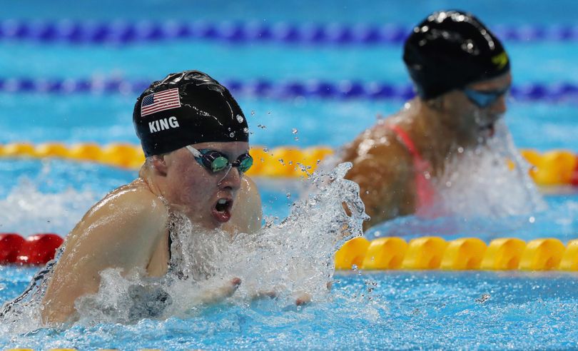 United States’ Lilly King, left, and Russia's Yulia Efimova compete in the final of the women’s 100-meter breaststroke. (Lee Jin-man / Associated Press)