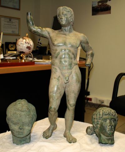 Greek police confiscated these bronze artifacts.  (Associated Press)