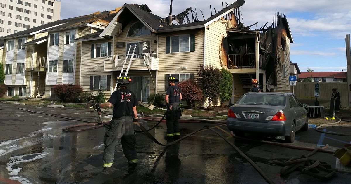 Apartment fire in north Spokane caused by cigarette lighter, fire