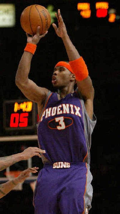 
Quentin Richardson made seven of Phoenix's team-record 16 3-pointers Tuesday. 
 (Associated Press / The Spokesman-Review)