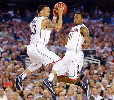 UConn’s Shabazz Napier and Ryan Boatright outplayed their freshman counterparts for Kentucky. (Associated Press)