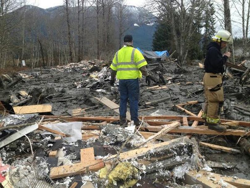 First responders search for victims of a mudslide near Oso, Wash., on March 22, 2014.  (Washington State Patrol)