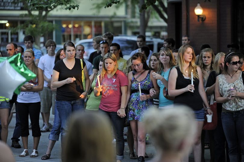 Hundreds of students, staff and friends gathered in Friendship Square in downtown Moscow Idaho to honor slain U/I grad student Katy Benoit on Thursday August 25, 2011.   (Christopher Anderson)