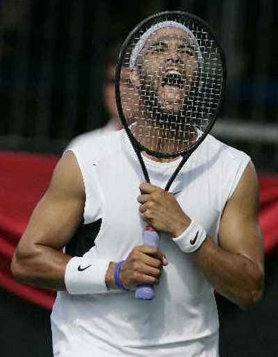 
James Blake reacts to missed shot at the RCA Championships, but he wasn't licked.
 (Associated Press / The Spokesman-Review)