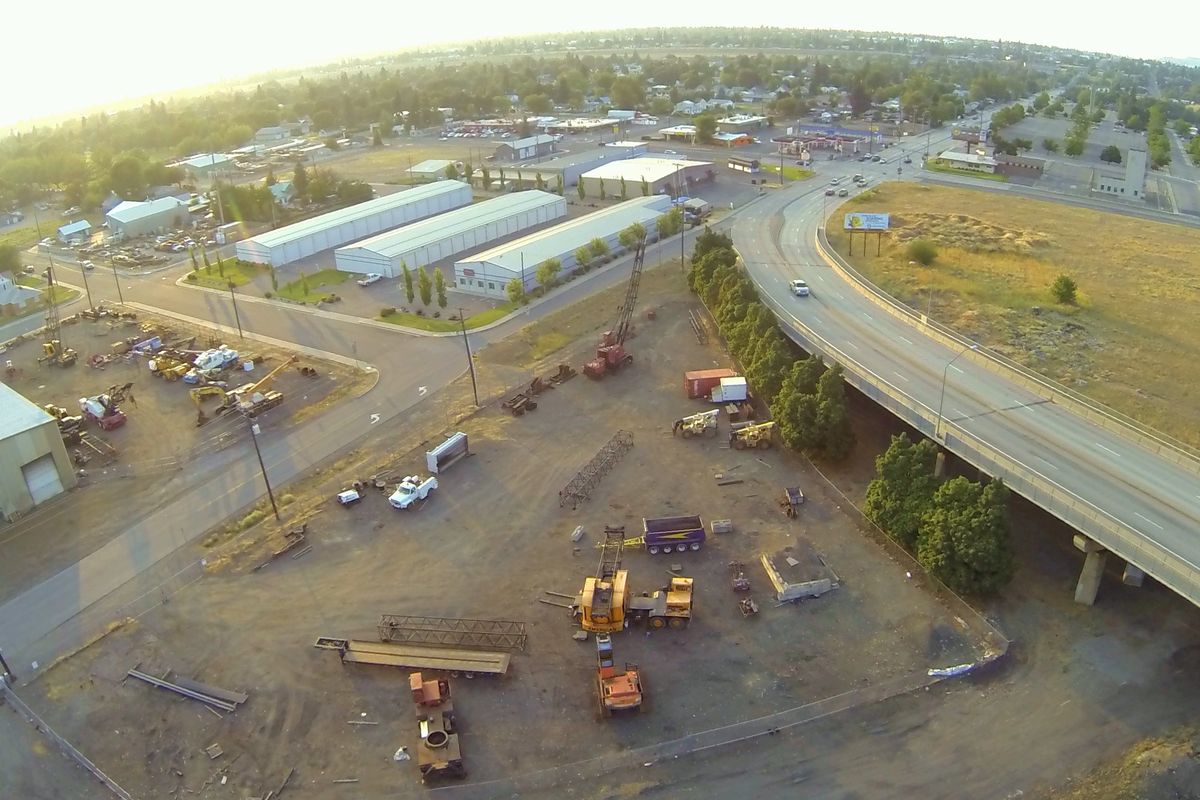 Where Freya Street curves to meet Greene Street on its way north, the future North Spokane Corridor will cut through the industrial neighborhood to the west, using land currently occupied by several longstanding heavy equipment businesses. (Jesse Tinsley)