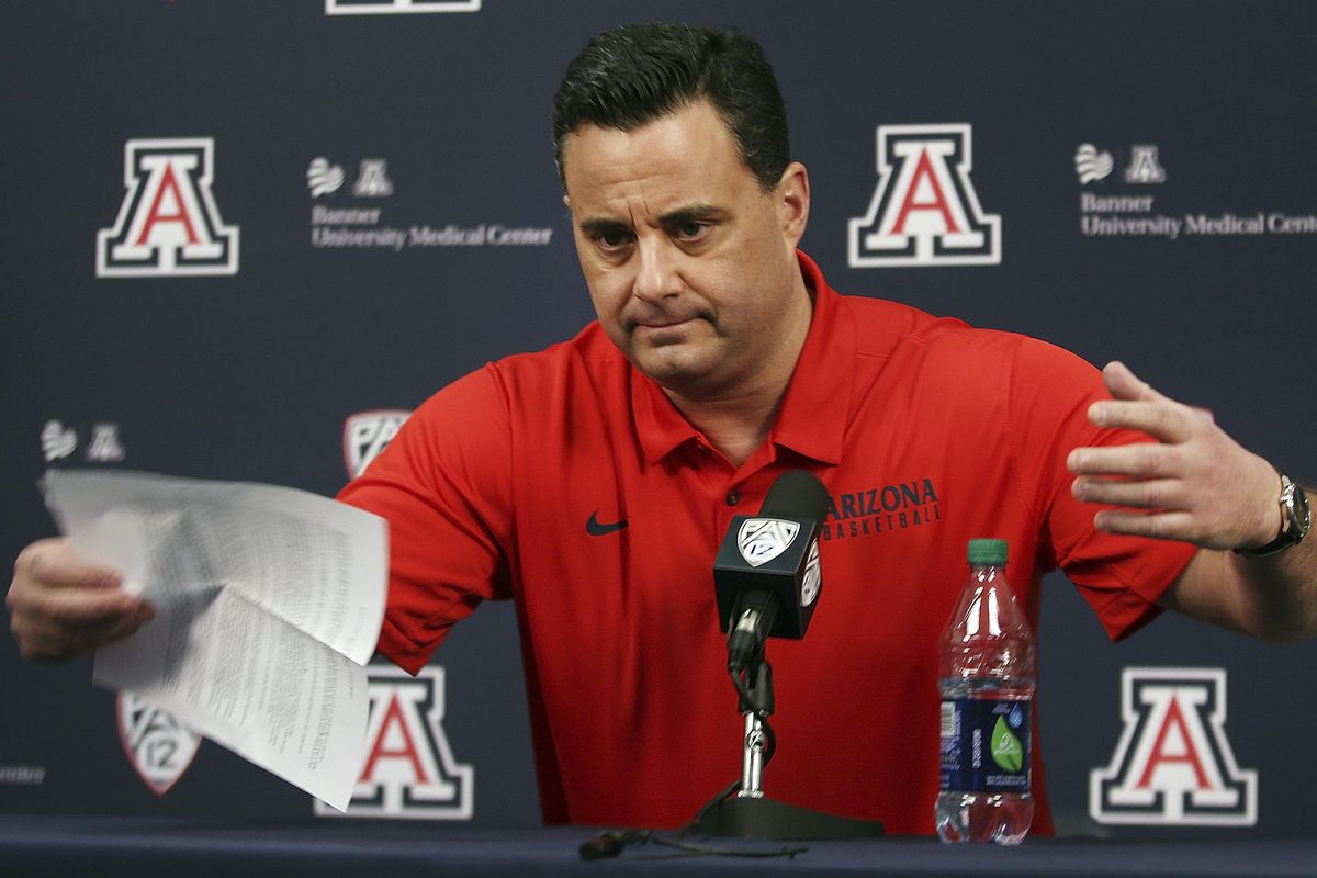 Arizona NCAA college basketball coach Sean Miller gestures during a press conference in Tucson, Ariz., Thursday, March 1, 2018. Miller vehemently shot down a report claiming he discussed a six-figure payment to a top recruit and said he looks forward to continuing to coach the team. (Mike Christy / AP)