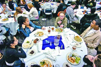 
Students from Havermale High School learn table etiquette at Spokane Community College on Tuesday as part of a four-day college camp.  About 120 students from the alternative school participated in the event, which includes mock lectures and the opportunity to meet college students and staff. 
 (Jed Conklin / The Spokesman-Review)