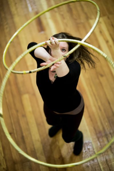 “It feels very uplifting for the spirit,” said Candice Walberg, a member of the dance troupe Visual Vortex, as she hoop dances in the lobby of the Community Building on Feb, 6. On Wednesday nights, the Visual Vortex group holds an open session of hoop dancing. (Colin Mulvany)