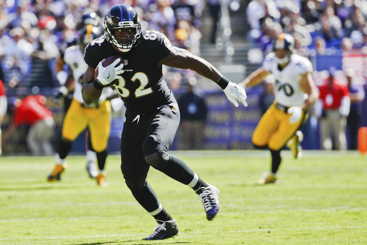 Baltimore Ravens tight end Benjamin Watson is shown carrying the ball during the first half of an NFL football game against the Pittsburgh Steelers in Baltimore on Oct. 1, 2017. Watson, along with J.J. Watt and Greg Olsen, is a finalist for the NFL