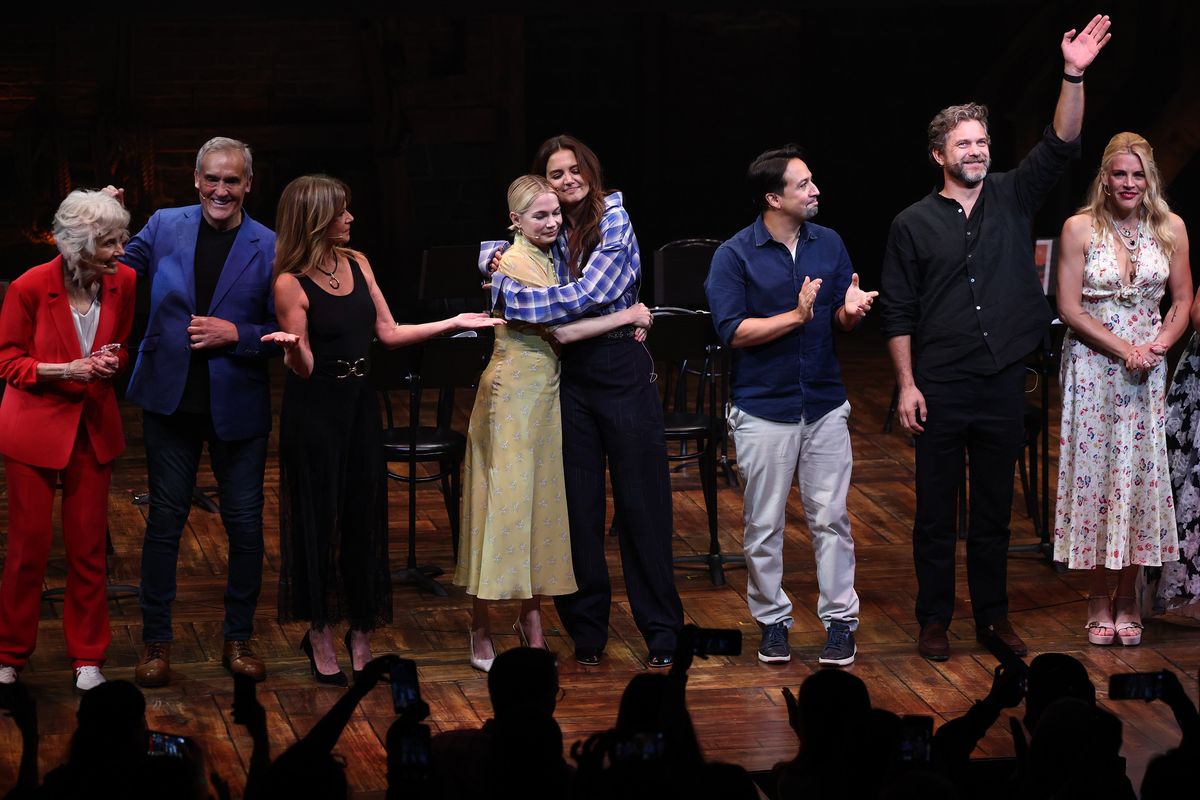Michelle Williams and Katie Holmes, center, embrace alongside cast members Monday during the Dawson’s Creek Class Reunion at Richard Rodgers Theatre in New York City. (Cindy Ord/Getty Images North America/TNS)