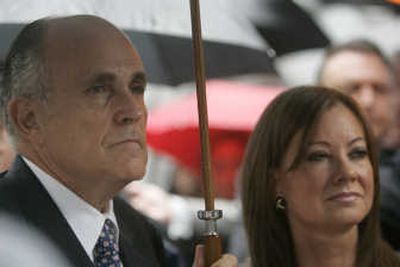
Republican presidential candidate and former New York mayor Rudy Giuliani and his wife, Judith, attend a commemoration of the Sept. 11 attacks  Tuesday in New York. Associated Press
 (Associated Press / The Spokesman-Review)