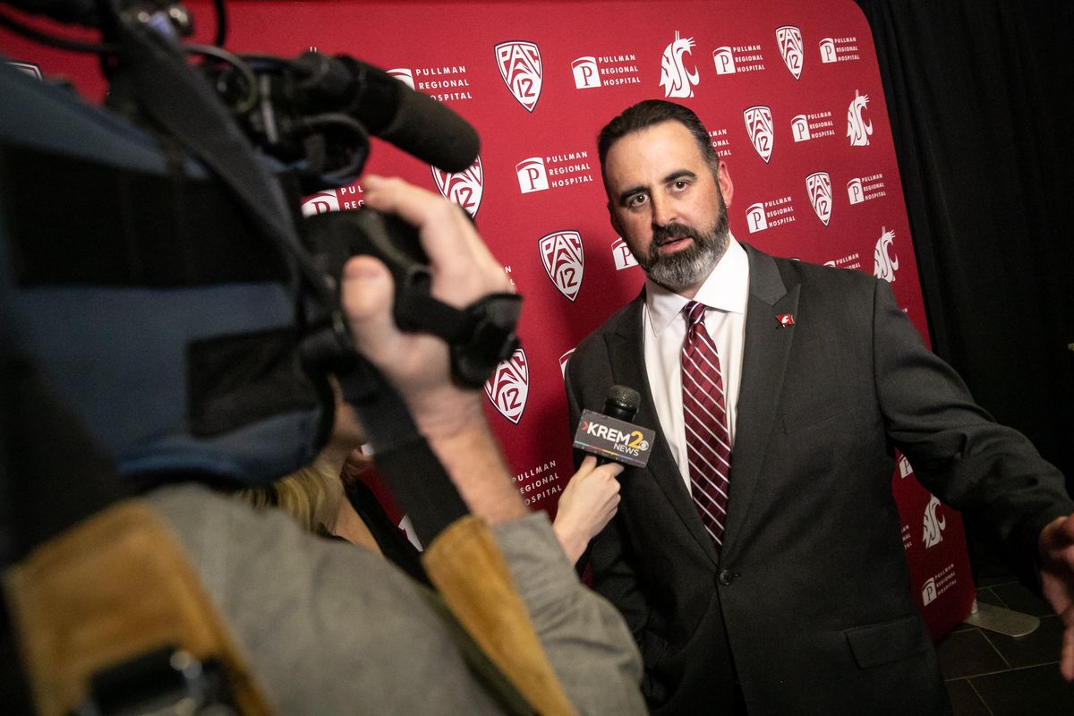 New Washington State University head football coach Nick Rolovich speaks to Brenna Greene of Krem following his introductory press conference at the university on Jan. 16, 2020 in Pullman, Wash. Rolovich coached at University of Hawaii for eight seasons, the last four as head coach, and officially replaced Mike Leach this week. (Libby Kamrowski / The Spokesman-Review)