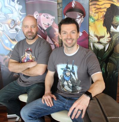 Spokane software engineer Nate Chatellier, right, and artist Manny Trembley are creating a “Season Two” sequel to their popular Dice Throne board game. (Michael Guilfoil / The Spokesman-Review)