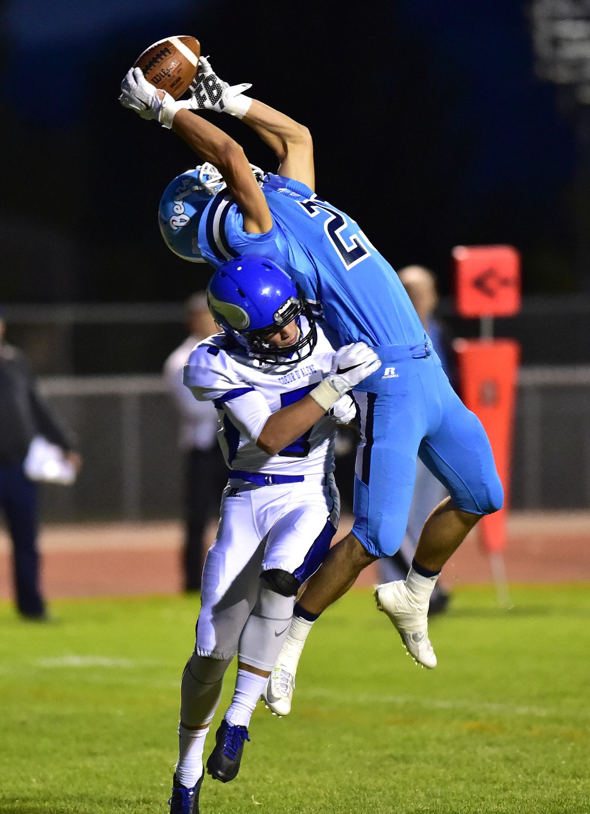 Central Valley’s Nathan Bannon was unable to hang on to this pass while getting hit by Coeur d’Alene’s. Alec Seibold. (Tyler Tjomsland)