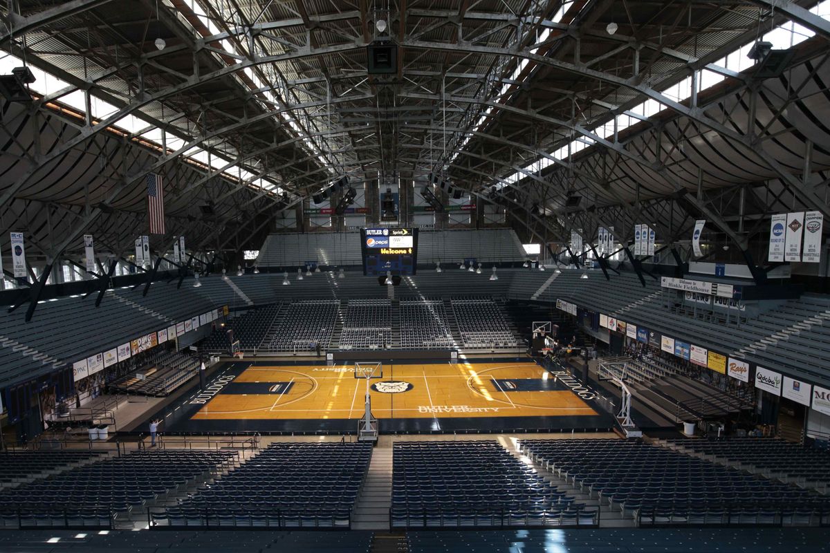 Sunlight shines through the windows onto the basketball court at Butler University’s Hinkle Fieldhouse. (Associated Press)