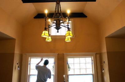 
There is handcrafted woodwork found throughout the Putney home, including this second-floor banister. 
 (hm_26home2_12-26-2006_PL9B7UB.jpg / The Spokesman-Review)