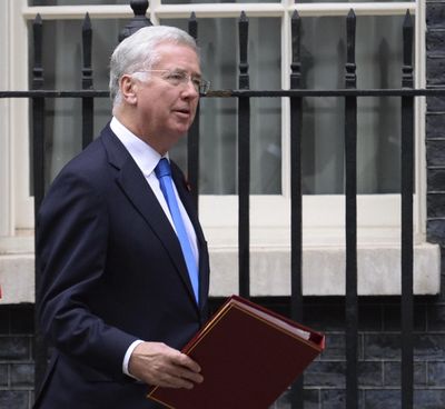 Britain's Defense Secretary Sir Michael Fallon leaves Downing Street following a Cabinet meeting, Tuesday Oct. 31, 2017 in London. (Stefan Rousseau / AP)
