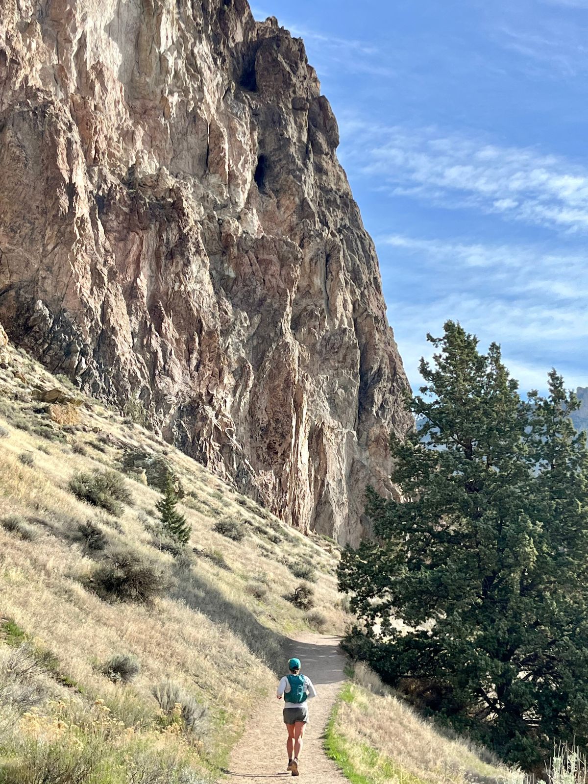 Lindsey Zembower pitter-patters along the south side of Smith Rock. (Ammi Midstokke/The Spokesman-Review)