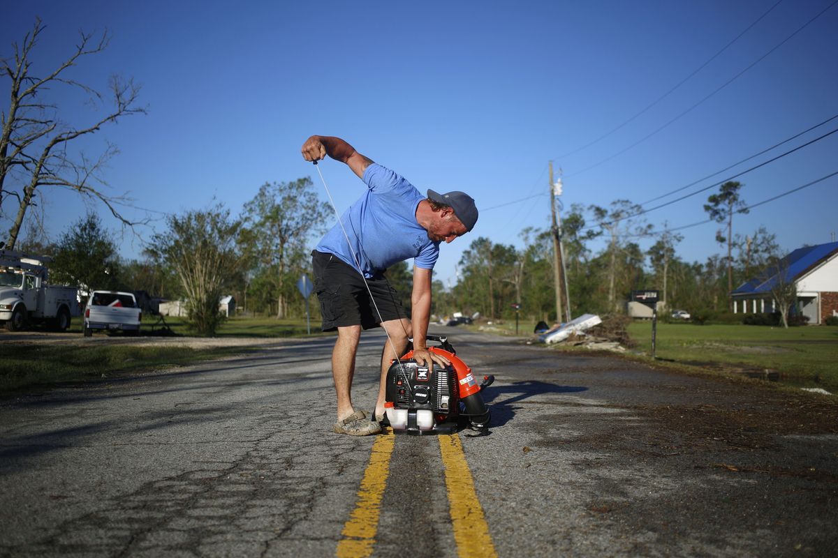 Gas-powered leaf blowers produce not just pollution but also noise levels that can damage hearing and disturb wildlife.  (Luke Sharrett/Bloomberg)