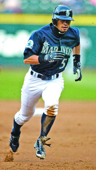 
Seattle's Ichiro Suzuki had a first-inning single to extend his hitting streak to a club-record 25 games. 
 (Associated Press / The Spokesman-Review)
