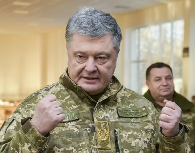 Ukrainian President Petro Poroshenko speak to soldiers during a visit to a military base in Chernihiv region, Ukraine, Wednesday, Nov, 28, 2018. Russia and Ukraine traded blame after Russian border guards on Sunday opened fire on three Ukrainian navy vessels and eventually seized them and their crews. (Mykola Lazarenko / Presidential Press Service)