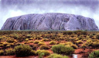 
Ayers Rock (Uluru) in central Australia is shown in this  file photo.  Starting in January 2009, a global poll will allow people worldwide to vote and select the seven natural wonders of the world. Associated Press photos
 (Associated Press photos / The Spokesman-Review)