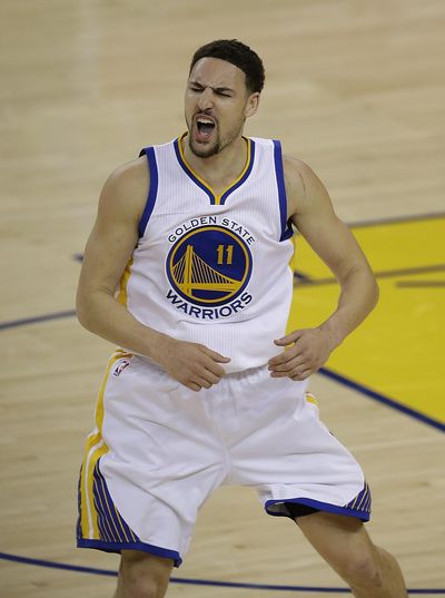 Warriors’ Klay Thompson celebrates a score in Golden State’s first-round series rout of the Houston Rockets. (Ben Margot / Associated Press)