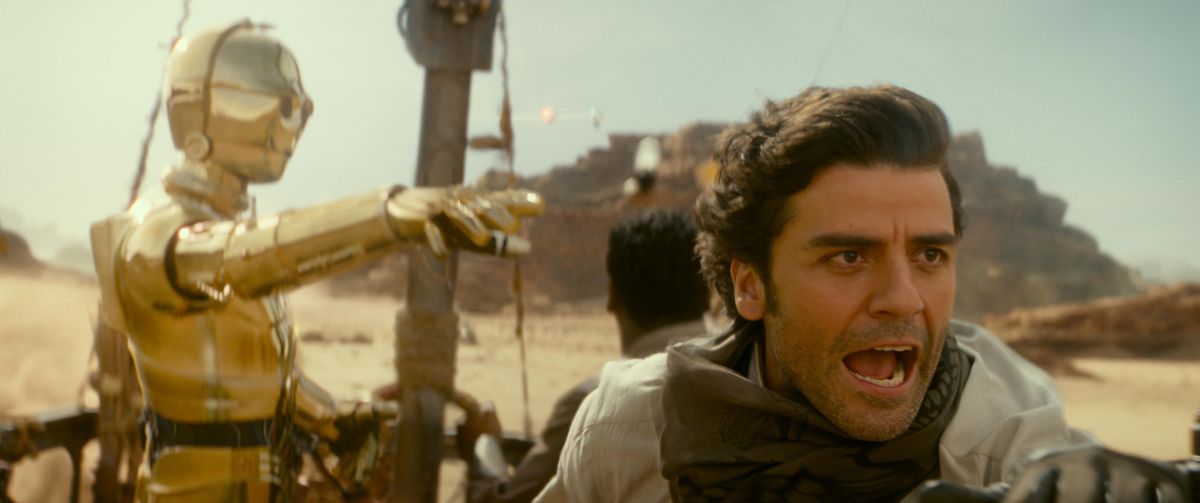 C-3PO, portrayed by Anthony Daniels, and Oscar Isaac as Poe Dameron in a scene from “Star Wars: The Rise of Skywalker.” (AP)