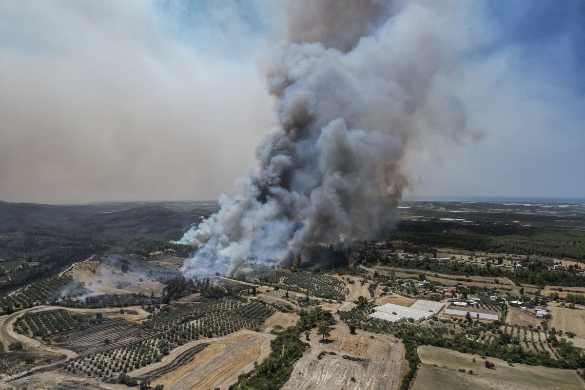 An aerial photo shows wildfires in Kacarlar village near the Mediterranean coastal town of Manavgat, Antalya, Turkey, Saturday, July 31, 2021. The death toll from wildfires raging in Turkey