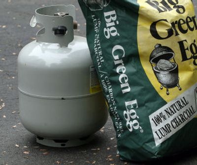 Another heated debate between propane, charcoal. Associated Press
(Associated Press / The Spokesman-Review)