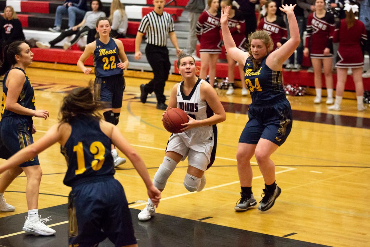 Quincy McDeid  of North Central goes to the hoop during a game at North Central High  on  Tuesday. Despite a neck-and-neck first half, the Mead Panthers beat the  Indians 64-51. (Libby Kamrowski / The Spokesman-Review)