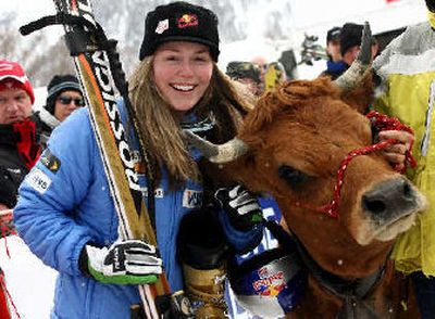 
United States skier Lindsey Kildow poses with her new cow, Olympe. 
 (Associated Press / The Spokesman-Review)