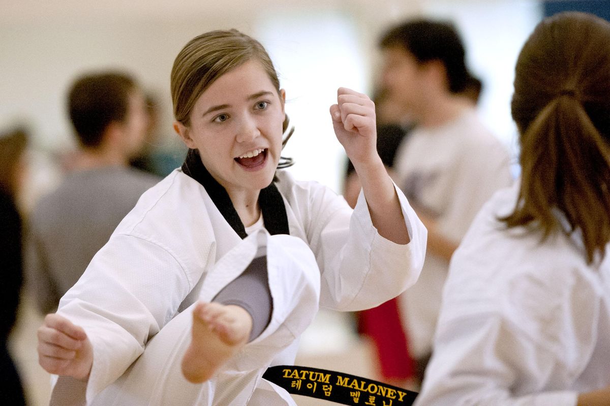 Tatum Maloney kicks toward Matea Bidaburu during judo class at Gonzaga University on Nov. 18. This year’s class has a record number of female participants. (Kathy Plonka / The Spokesman-Review)