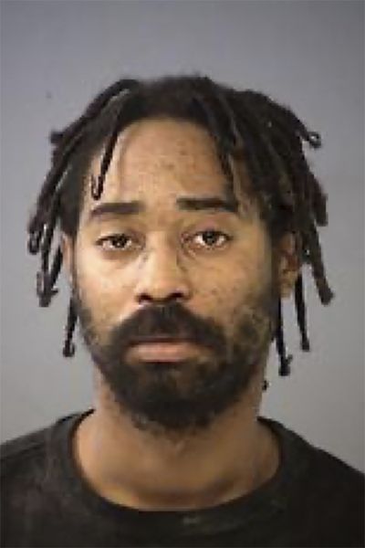 This undated photo provided by the Indianapolis Metropolitan Police Department shows Malik Halfacre. Halfacre, suspected of killing three adults and a child and abducting his baby daughter, had pulled out a gun and opened fire following a heated argument at an Indianapolis home, police said Monday, March 15, 2021.  (HOGP)