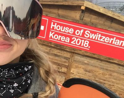 Heather Parham of Spokane in front of the Switzerland House at South Korea’s Yongpyong Alpine Center. (HEATHER PARHAM / SR)