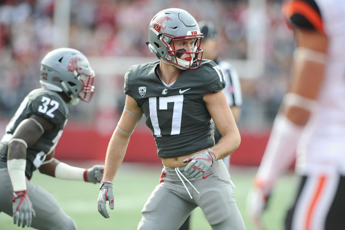 Washington State wide receiver Kyle Sweet (17) pauses between plays during the first half of a Pac-12 football game on Sept. 19, 2017, at Martin Stadium in Pullman. (Tyler Tjomsland / The Spokesman-Review)