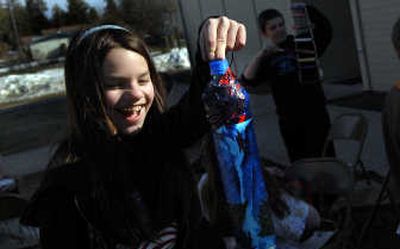 
Spirit Lake Elementary sixth-grader Jenny Hughes works on her rainstick. The students researched and developed plans to build their own instruments.
 (Kathy Plonka / The Spokesman-Review)