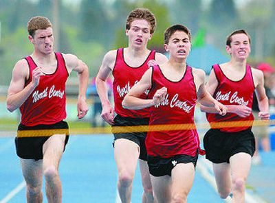 
From left to right, North Central's Steve Hicks (2nd), Alex Avila (3rd) Leon Dean (1st) and Andrew Kimpel sweep 3A 1,600 meters.
 (Dan Pelle / The Spokesman-Review)