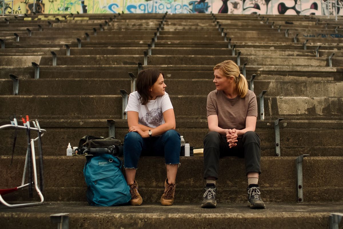 Cailee Spaeny, left, and Kirsten Dunst in the movie “Civil War.”  (A24)