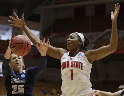 George Washington’s Kelli Prange (25) and Ohio State’s Stephanie Mavunga (1) battle for a loose ball in the first half during a first-round game in the women’s NCAA Tournament on Saturday, March 17, 2018, in Columbus, Ohio. (Tony Dejak / Associated Press)