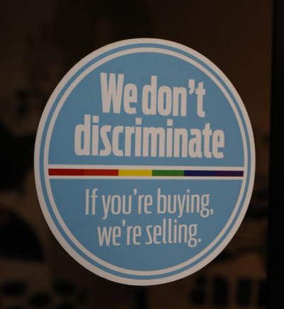 This nondiscrimination sticker is in the window of Steve's, a downtown Jackson, Miss., restaurant, Monday, Oct. 2, 2017. (Rogelio V. Solis / Associated Press)
