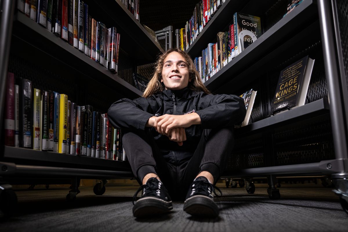 Cheney diver Alma Smith poses at the Spokane Central Public Library. (COLIN MULVANY/THE SPOKESMAN-REVI)