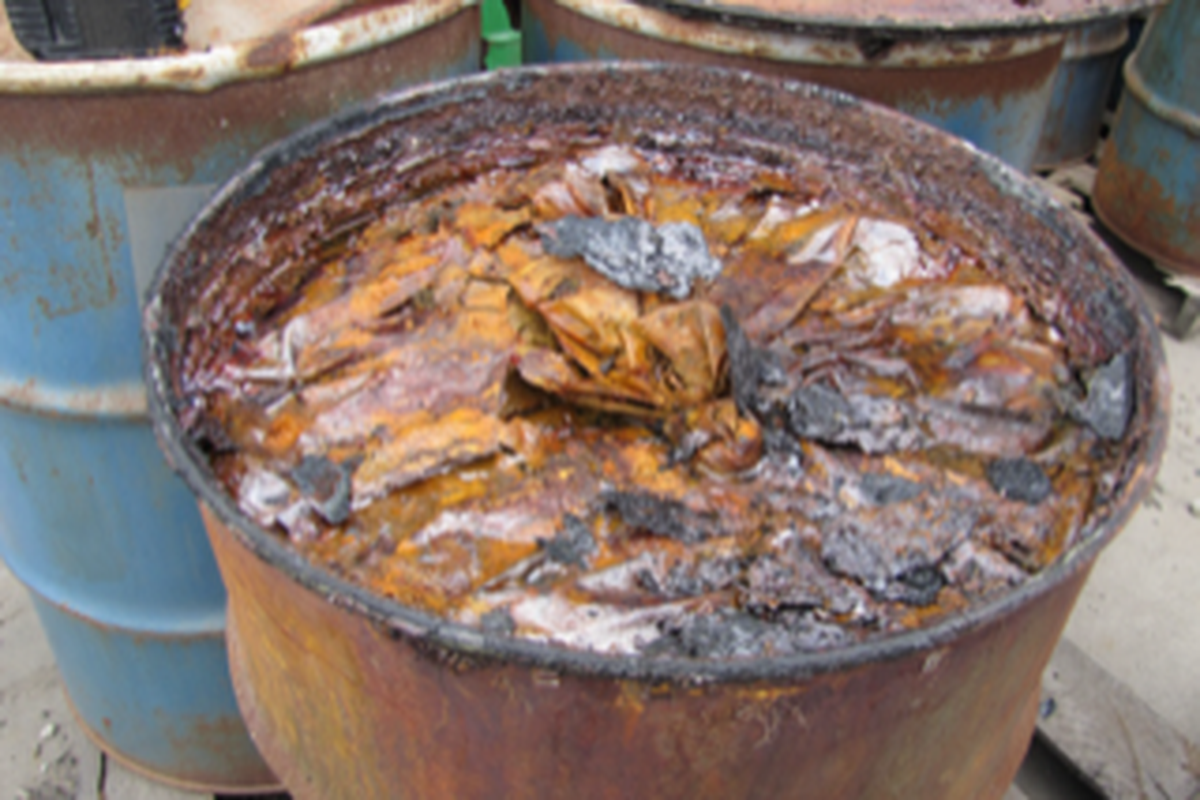 A barrel of juice concentrate is seen in 2018 with mold on top at property owned by Valley Processing in Sunnyside, Wash.  (U.S. Attorney