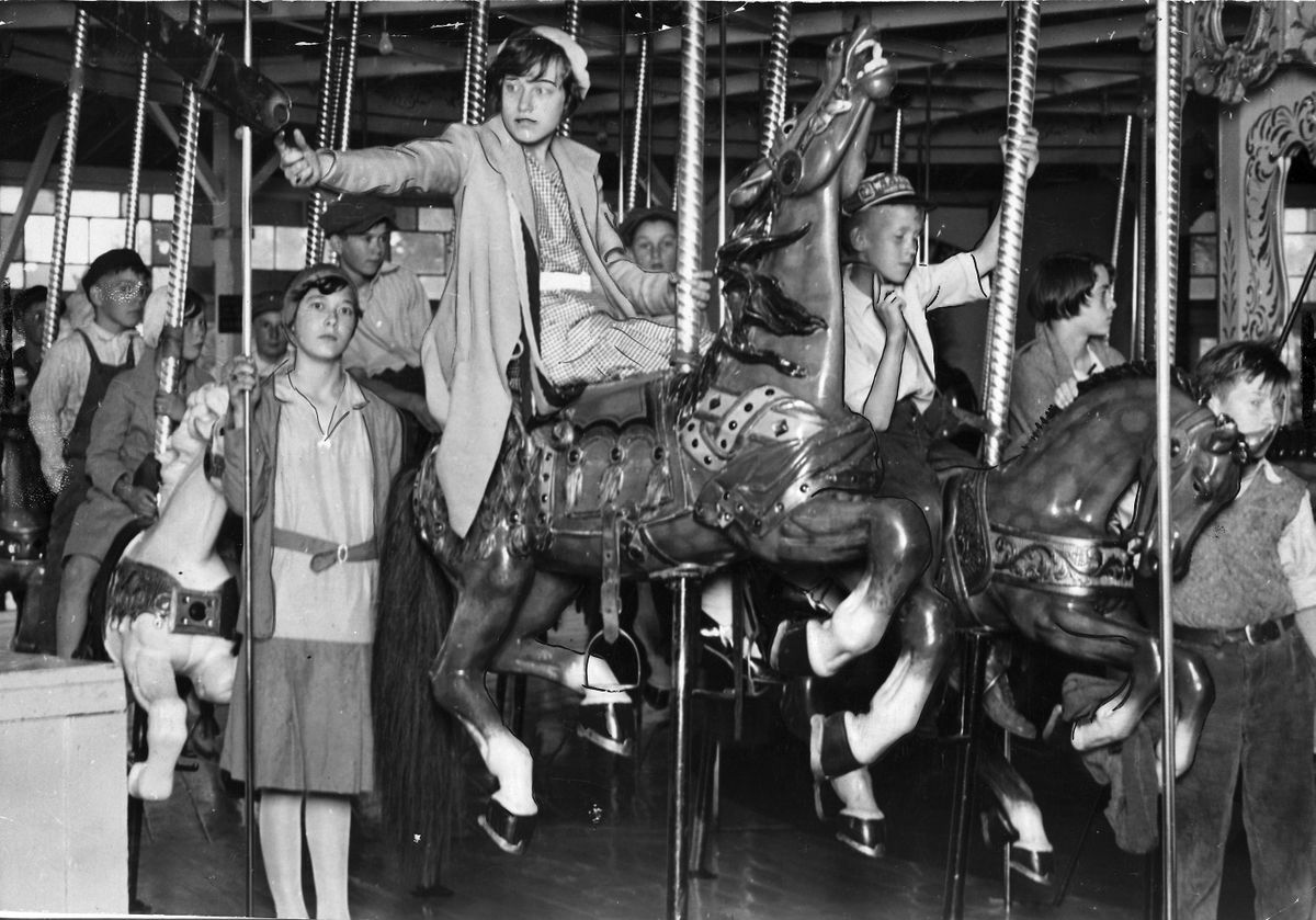 The Carrousel,  built by German woodcarver Charles I.D. Looff in the early 1900s,  was sent  to Spokane as a wedding  gift  for his daughter and Louis Vogel, who ran Natatorium Park.  Photo taken in 1930.  (PHOTO ARCHIVE / The Spokesman-Review)